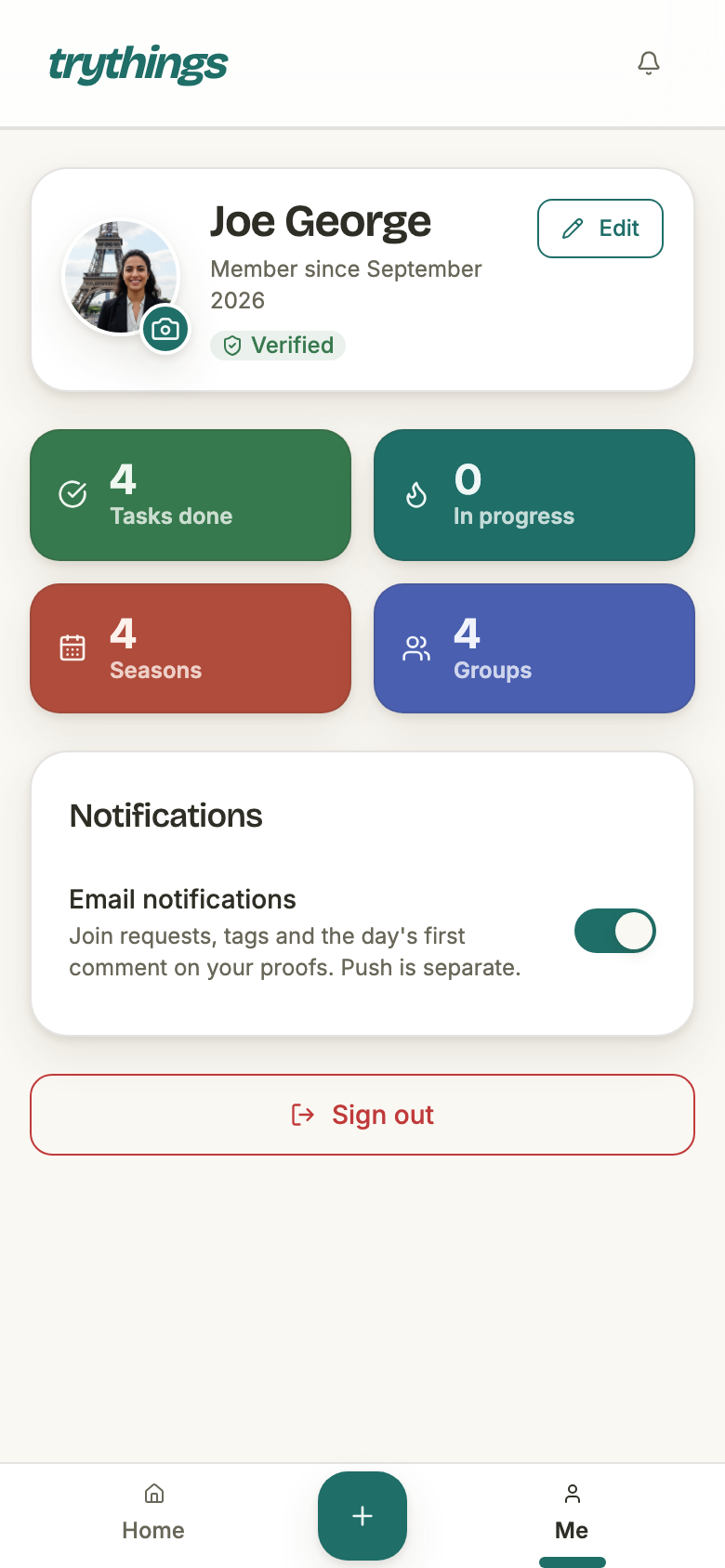 The profile page on a phone: an avatar with a camera badge, the name Joe George, Member since September 2026, a Verified badge, an Edit button, four coloured stat tiles reading 4 Tasks done, 0 In progress, 4 Seasons and 4 Groups, a Notifications card with an Email notifications switch turned on, and a red Sign out button.